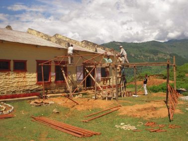 Repairs are conducted on a health clinic in Nepal