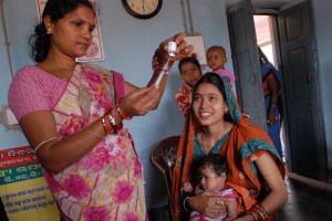 A community health worker in India vaccinates a child. Only 44% of children ages 1 to 2 are fully vaccinated in India. Source: Pippa Ranger, UK, DFD
